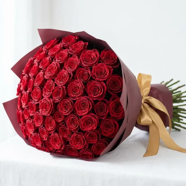 Fresh red rose bouquet with black wrapping - FlowerDeliveryPK Pakistan